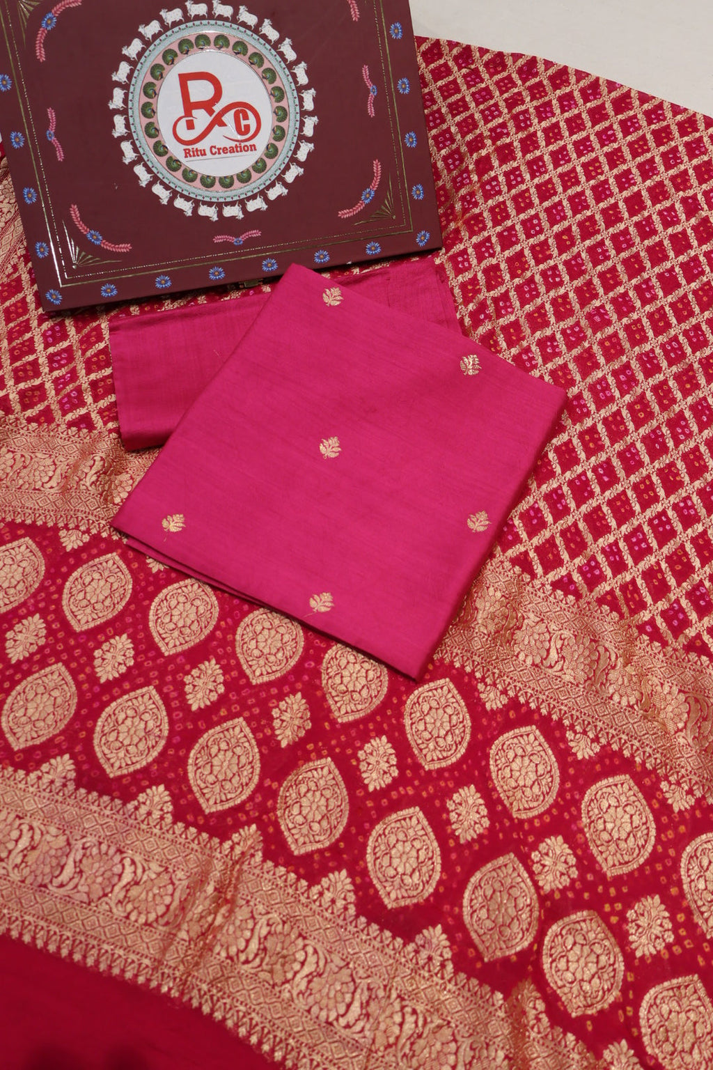 Rani Pink Pure Banarasi Chiniyal Silk Unstitched Suit Set With Pure Khadi Georgette Bandhej Dupatta The Banarasee Aura
