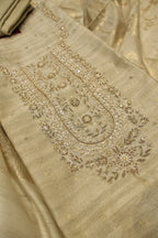Beige Tussar Silk Hand Embroidered Unstitched Suit Set with Tussar Silk Woven Dupatta The Banarasee Aura