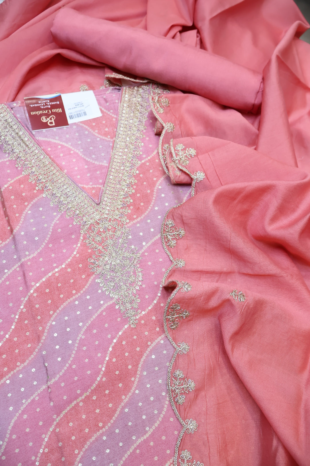 Peach Muslin Lehriya Printed and Embroidered Unstitched Suit Set With Muslin Embroidered Dupatta The Banarasee Aura