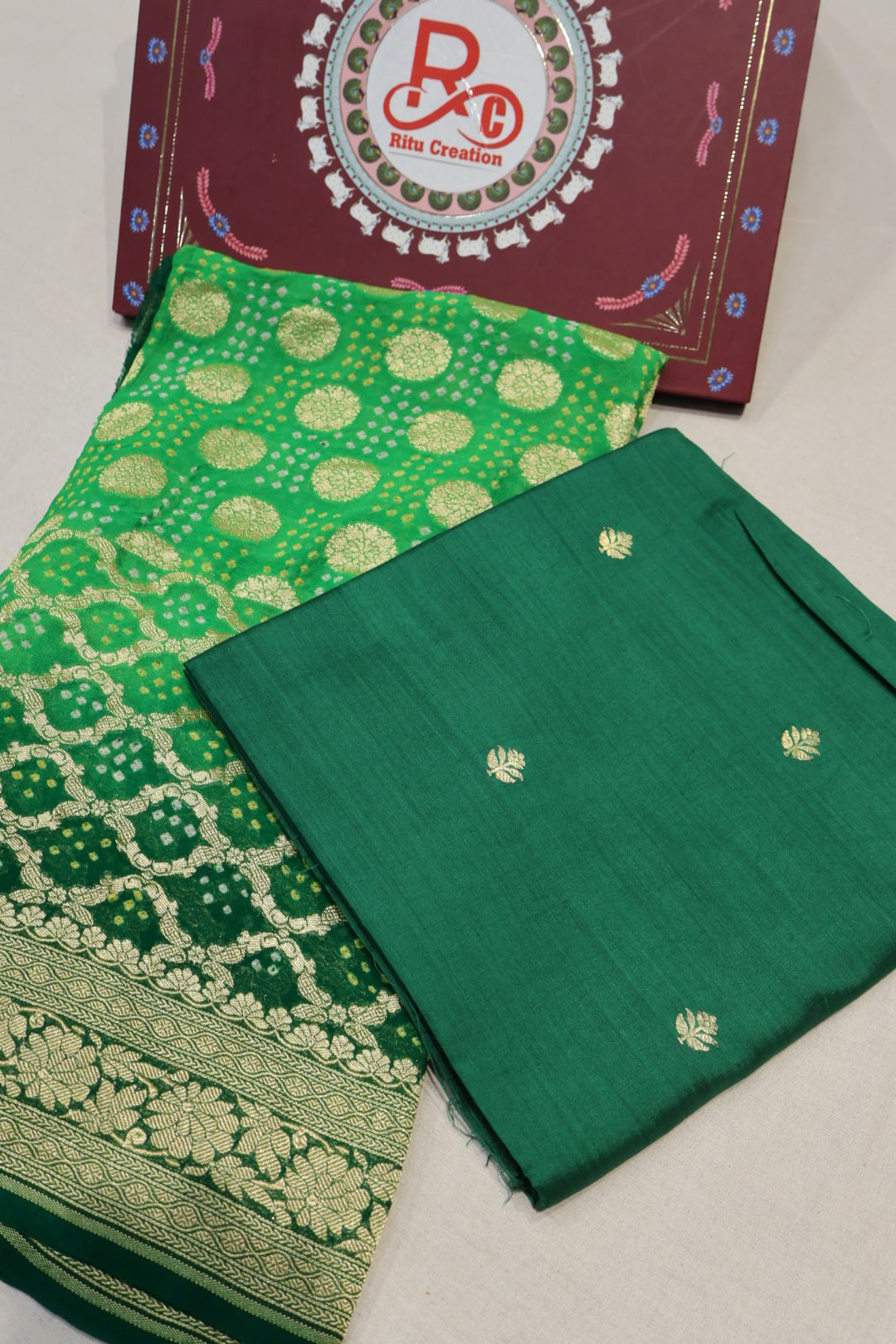 Bottle Green Pure Banarasi Chiniyal Silk Unstitched Suit Set With Pure Khadi Georgette Bandhej Dupatta The Banarasee Aura